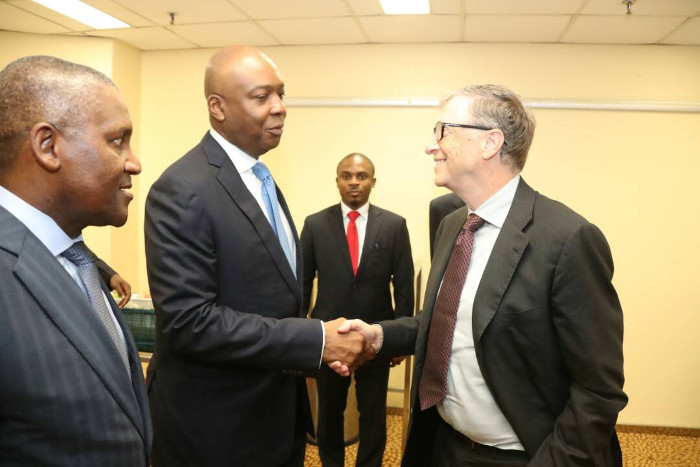 Saraki in handshake with Bill Gates as Aliko Dongote stands by