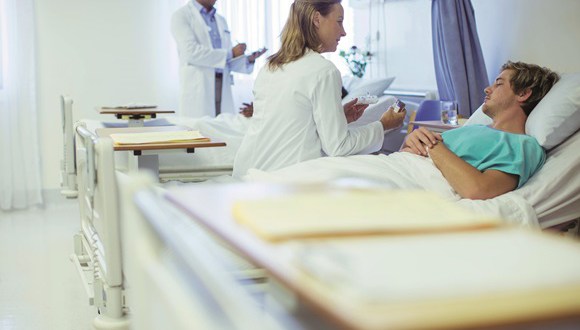 1069438 hospital pharmacist consulting with patient 15
